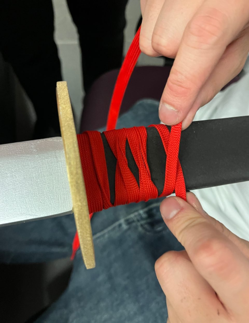 Image of me wrapping the katana tsuka, the handle